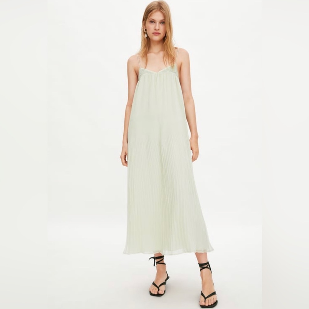 Eggshell Zara pleated dress.